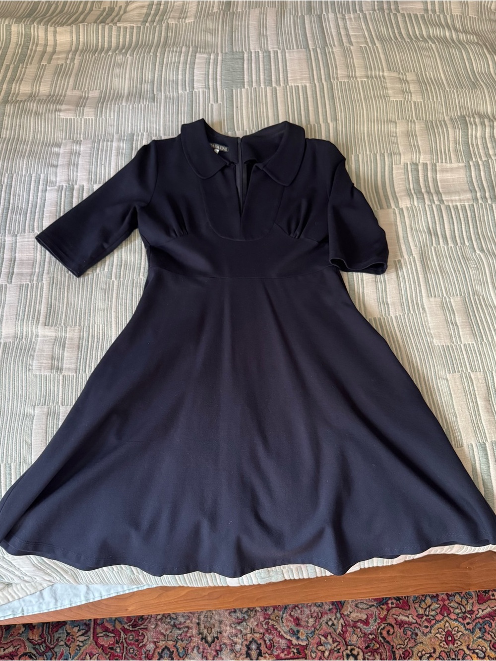 Navy blue collared dress, empire waist, swing skirt